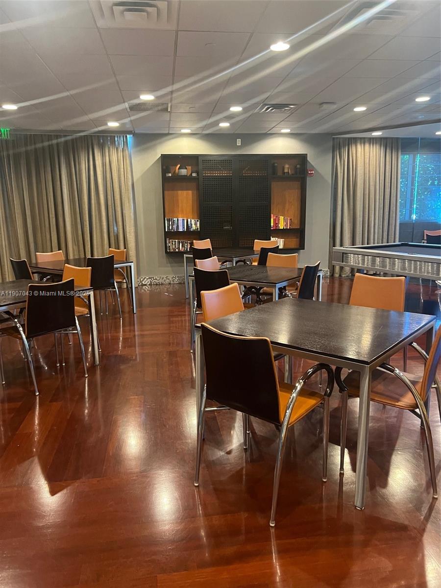 9401 Collins Avenue, Unit 801 Surfside, FL 33154 - Photo 37 of 51 a view of a dining room with furniture