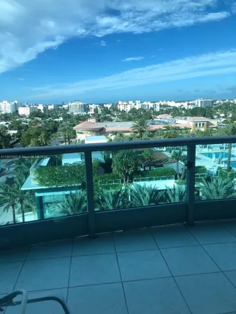 a view of balcony with furniture