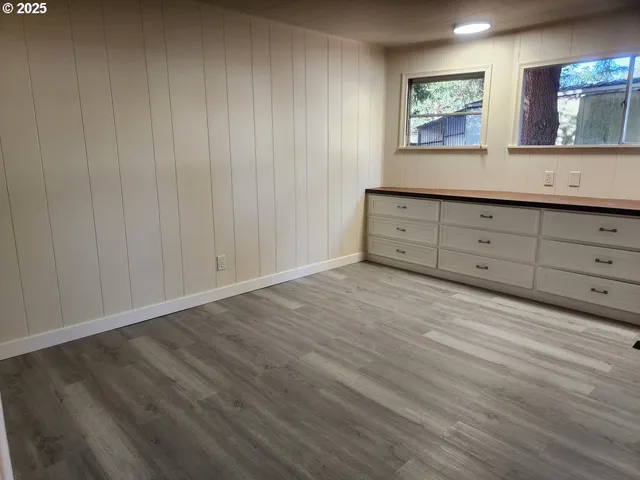 a view of a bathroom with sink and mirror