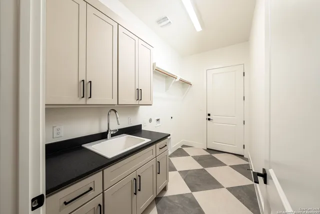 a living room with a couch and a window