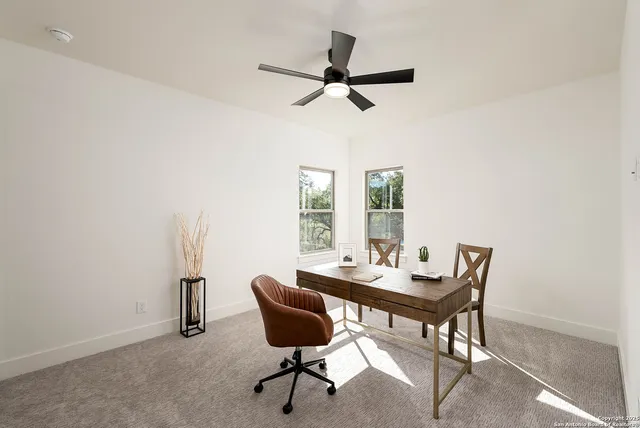 a bathroom with a sink double vanity and a bathtub