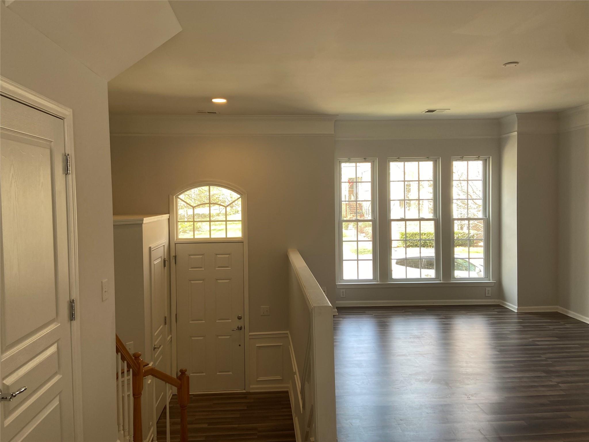722 Passage Drive Fort Mill, SC 29708 - Photo 3 of 13 wooden floor in an empty room with a window