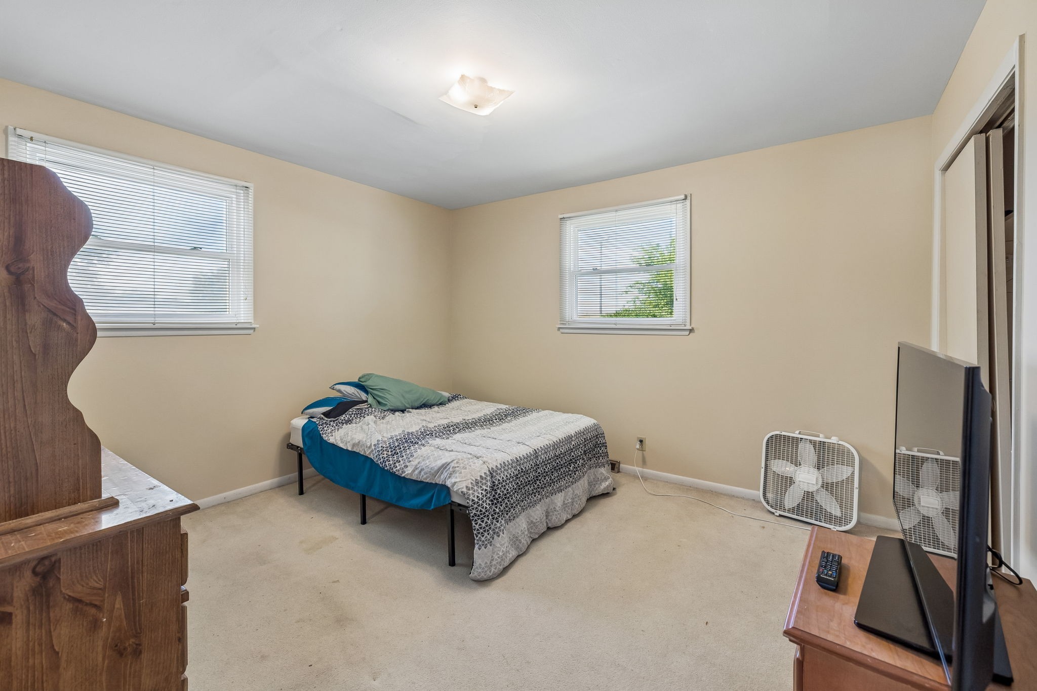 1246 Apache Lane Madison, TN 37115 - Photo 11 of 21 a bedroom with a bed and cabinets