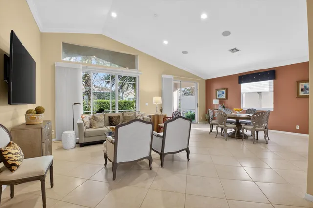 a kitchen with granite countertop a stove sink and cabinets