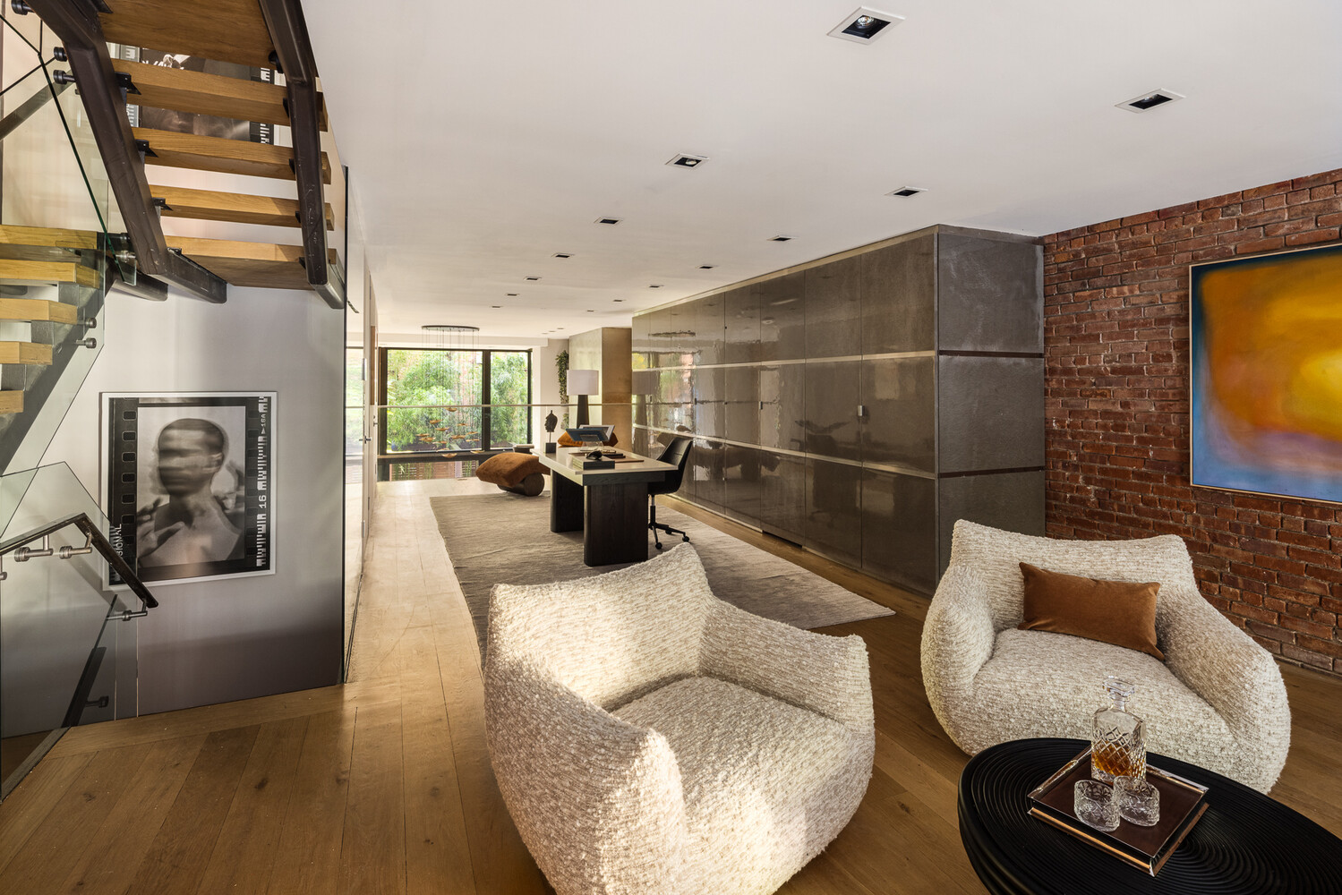 80 West Washington Place Manhattan, NY 10011 - Photo 12 of 33 a living room with furniture and a flat screen tv