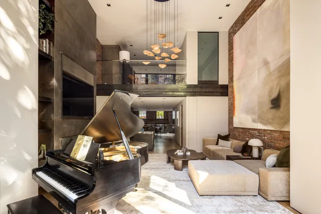 a black and white photo of a living room