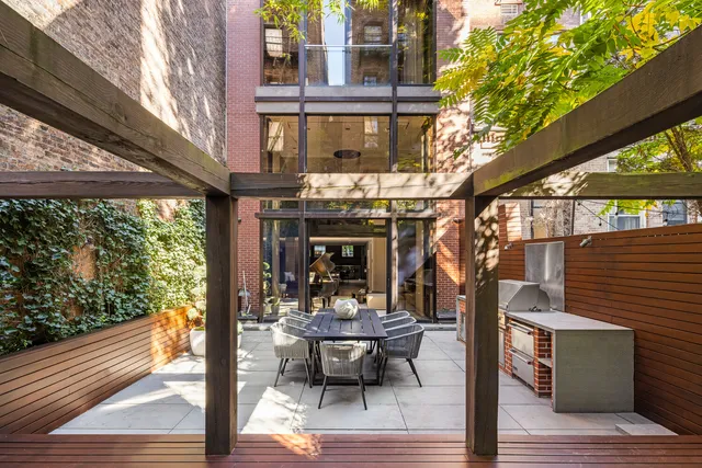 a outdoor space with a couch and chairs