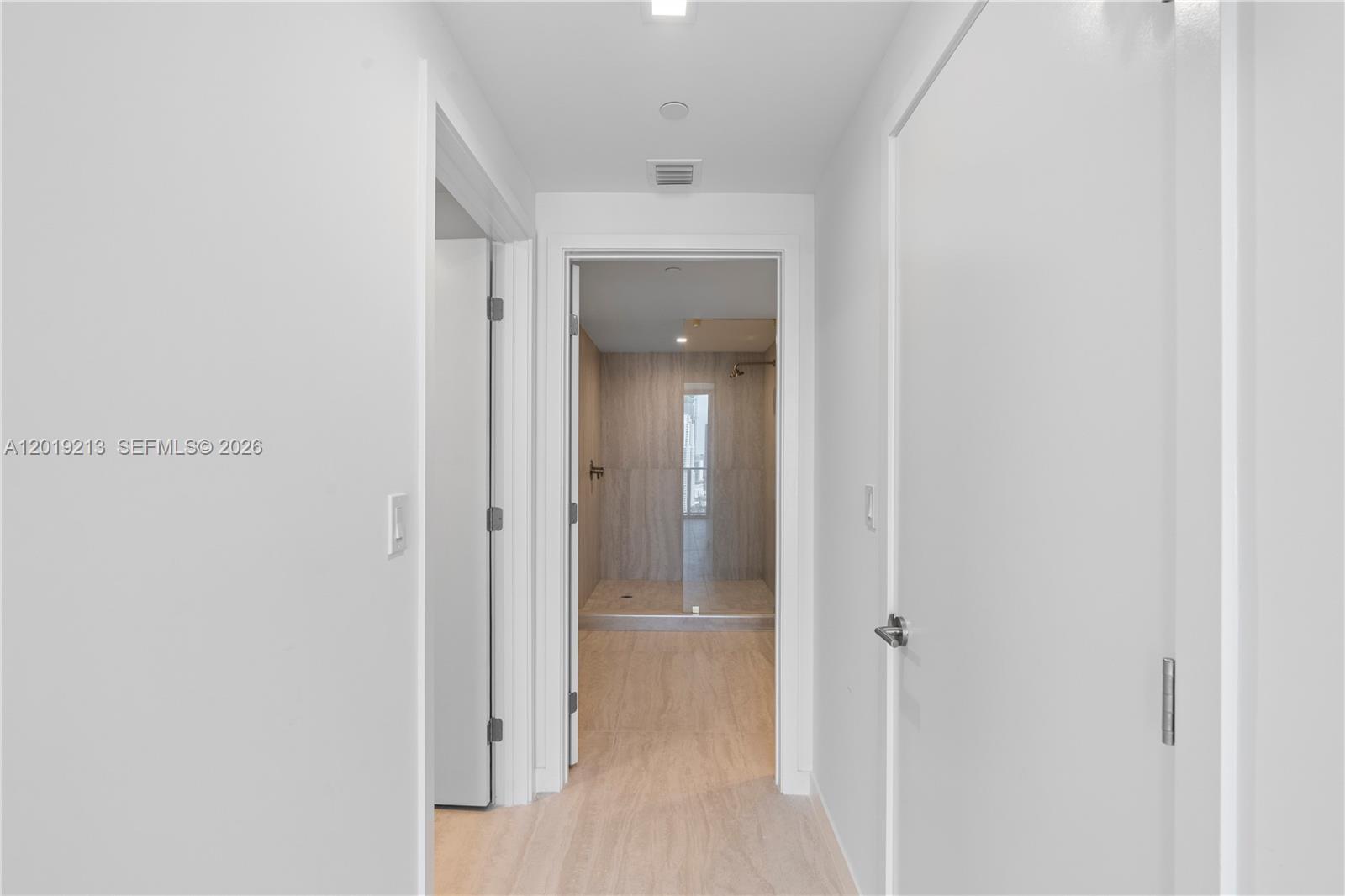 77 Southeast 5th, Unit 3702 Miami, FL 33131 - Photo 18 of 63 a view of a hallway