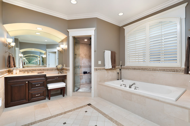 1111 West Wolfram Street Chicago, IL 60657 - Photo 13 of 25 a bathroom with a tub sink and mirror