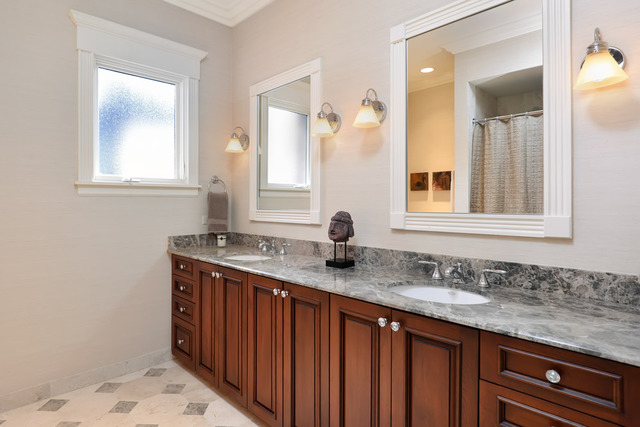 1111 West Wolfram Street Chicago, IL 60657 - Photo 18 of 25 a bathroom with a granite countertop sink a mirror and a window