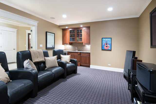 1111 West Wolfram Street Chicago, IL 60657 - Photo 20 of 25 a living room with furniture a flat screen tv and a wooden floor