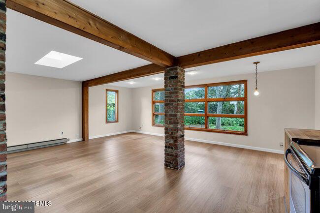 305 Nautilus Boulevard Forked River, NJ 08731 - Photo 12 of 28 a view of empty room with wooden floor and fan