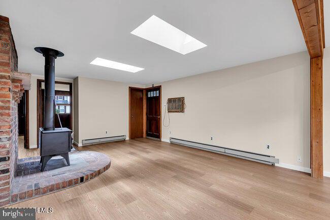 305 Nautilus Boulevard Forked River, NJ 08731 - Photo 15 of 28 a view of livingroom with hardwood floor and a ceiling fan
