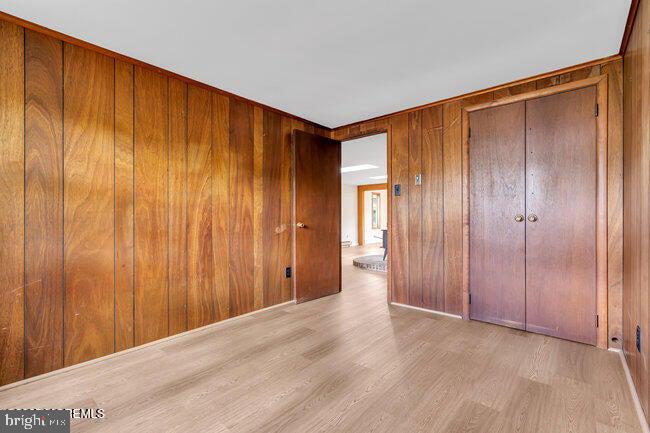 305 Nautilus Boulevard Forked River, NJ 08731 - Photo 21 of 28 a view of a big room with wooden floor and closet