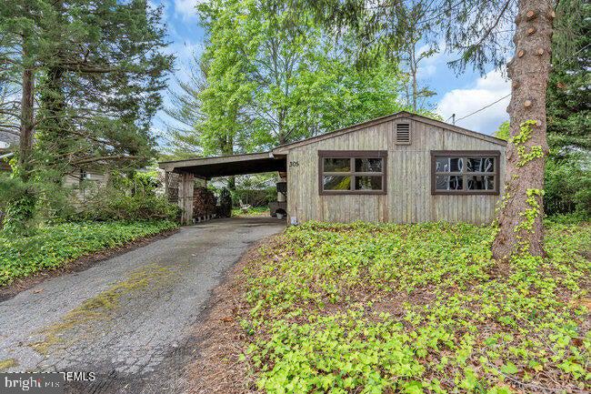 305 Nautilus Boulevard Forked River, NJ 08731 - Photo 23 of 28 front view of a house with a yard