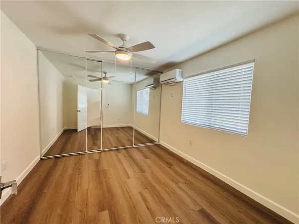 a bathroom with a tub and shower