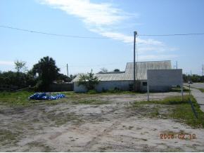 1735 Croton Road Melbourne, FL 32935 - Photo 4 of 11 a big yard with lots of green space