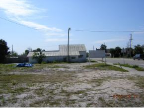 1735 Croton Road Melbourne, FL 32935 - Photo 5 of 11 a fire hydrant in the middle of a field