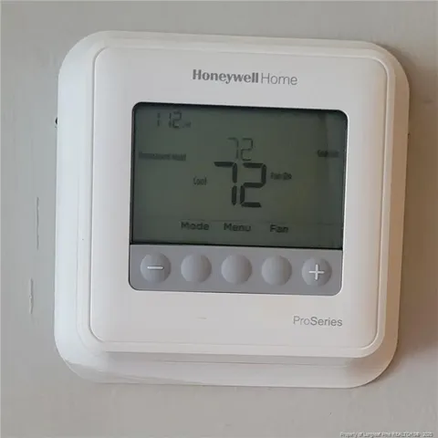 a view of a outdoor space with a lot of flower plants