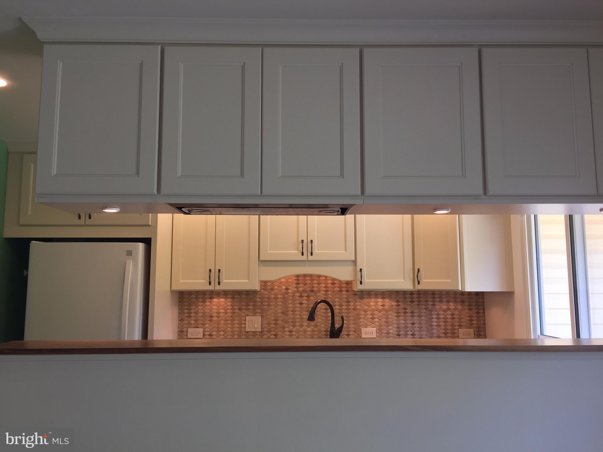 14928 Hydrus Road Silver Spring, MD 20906 - Photo 12 of 24 Kitchen breakfast bar from dining room