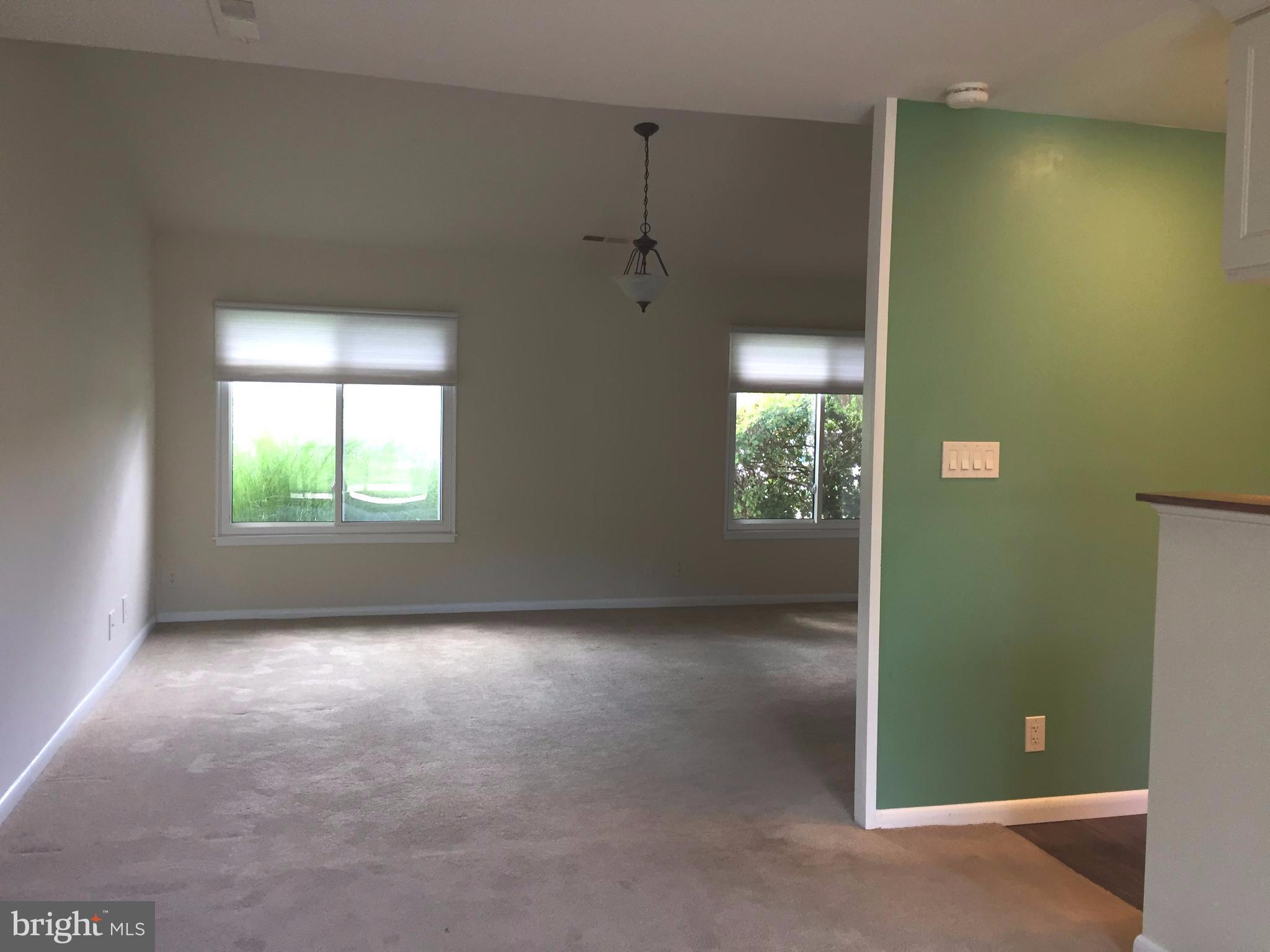 14928 Hydrus Road Silver Spring, MD 20906 - Photo 8 of 24 Dining Room to kitchen and livingroom