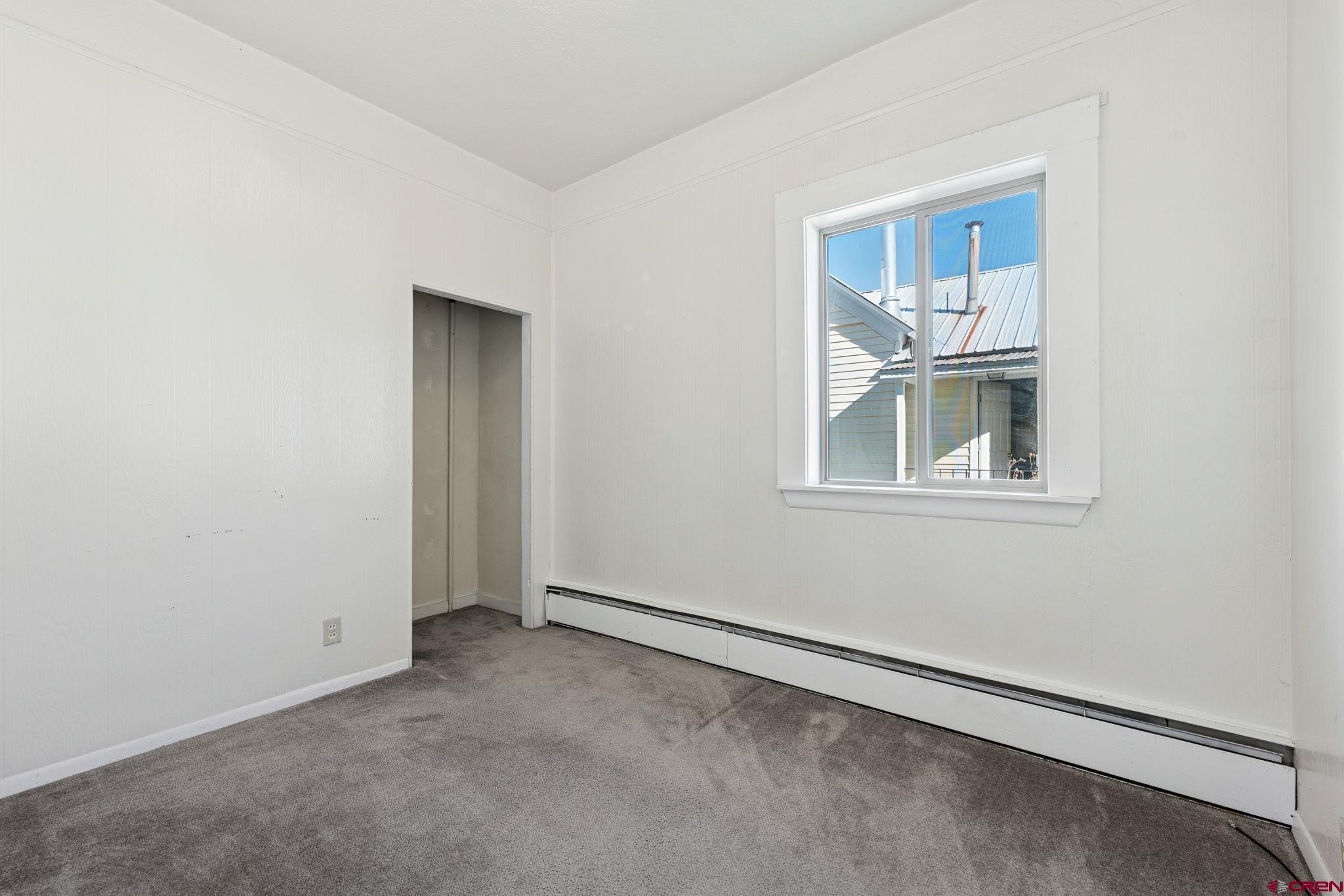 1840 West 3rd Avenue Durango, CO 81301 - Photo 14 of 33 a view of an empty room with a window