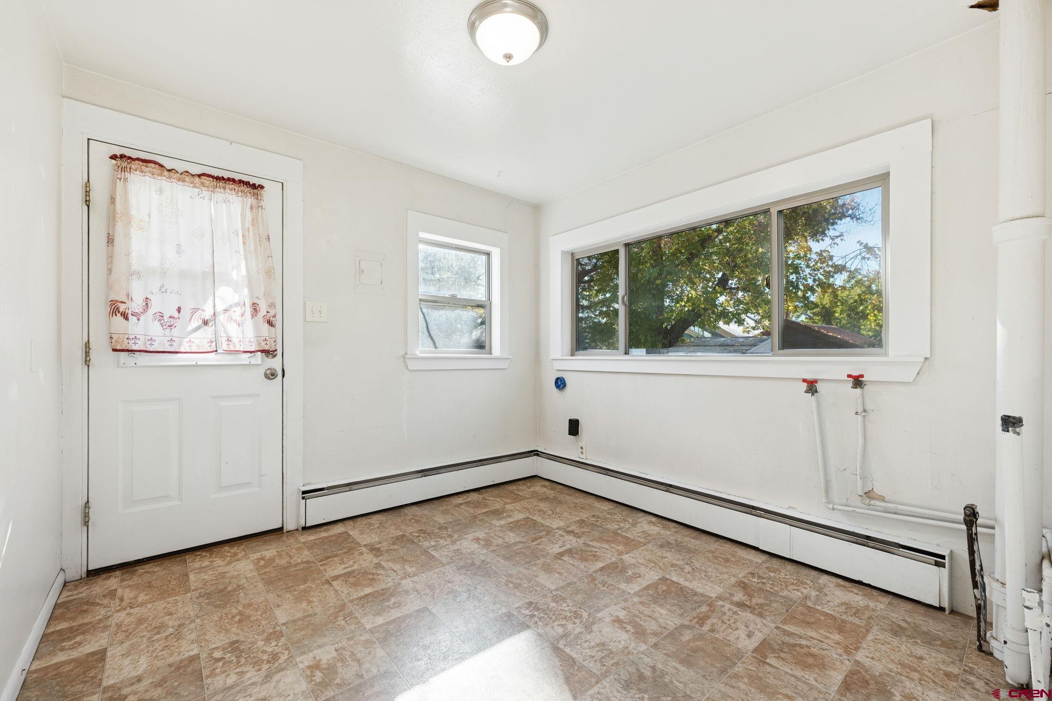1840 West 3rd Avenue Durango, CO 81301 - Photo 20 of 32 an empty room with windows
