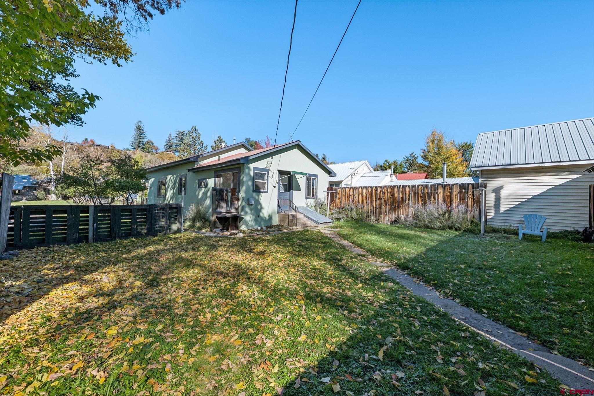 1840 West 3rd Avenue Durango, CO 81301 - Photo 22 of 32 a view of a house with backyard and garden