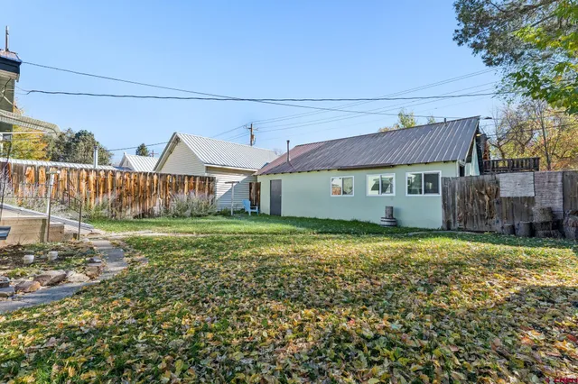 a bedroom with a bed and a closet