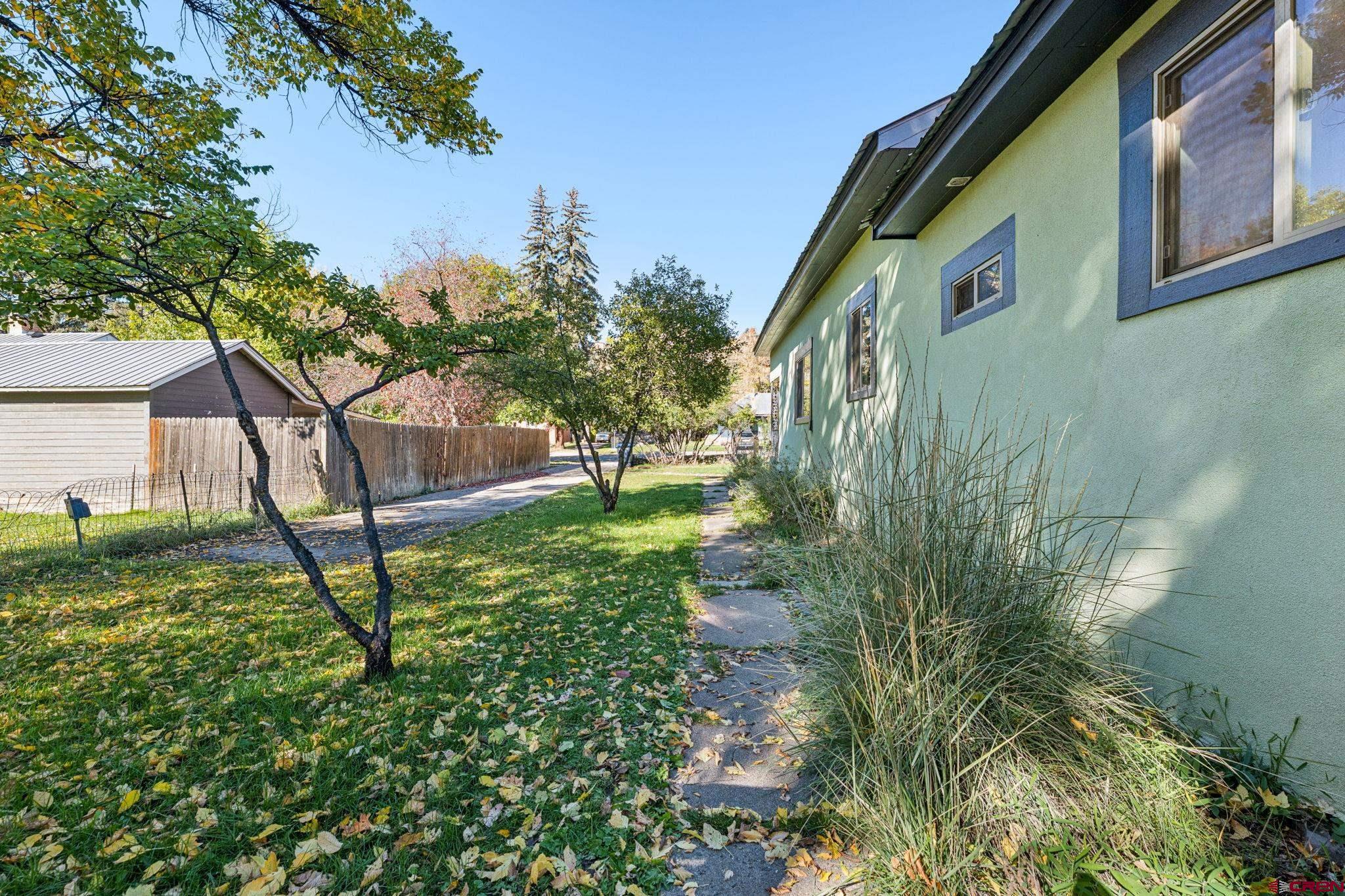 1840 West 3rd Avenue Durango, CO 81301 - Photo 24 of 33 a backyard of a house with lots of green space