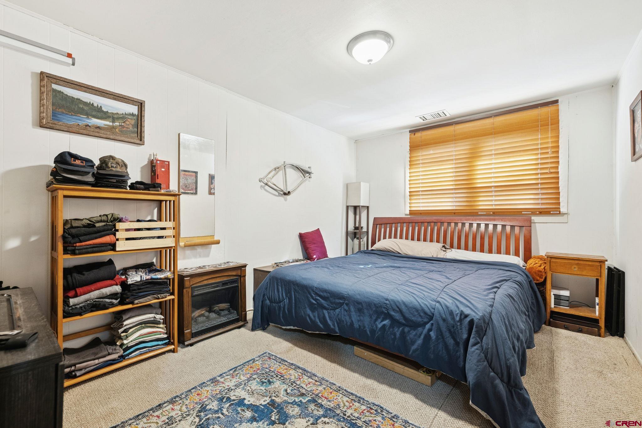 1840 West 3rd Avenue Durango, CO 81301 - Photo 25 of 32 a bedroom with a bed and a closet