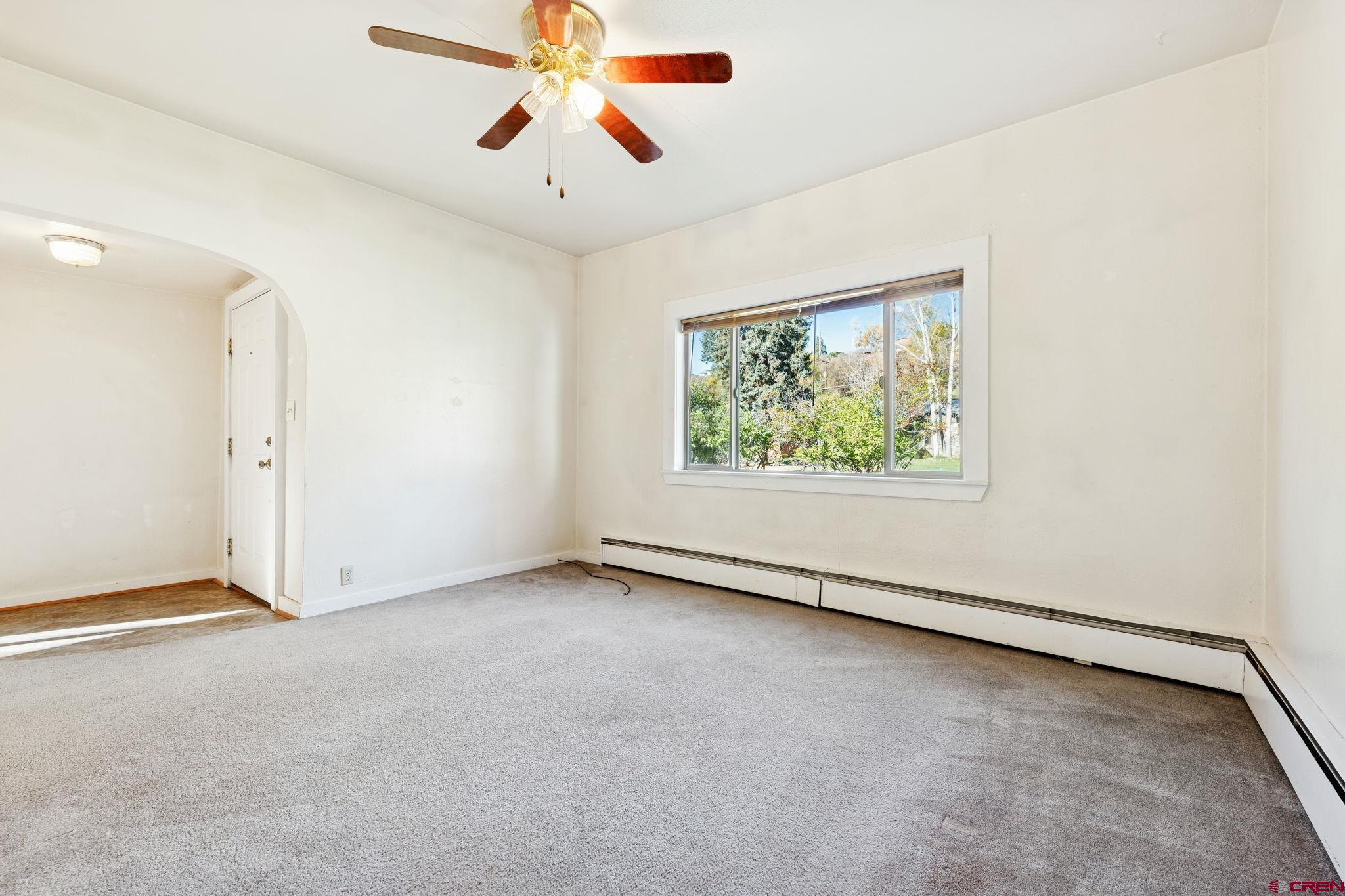 1840 West 3rd Avenue Durango, CO 81301 - Photo 10 of 33 an empty room with windows