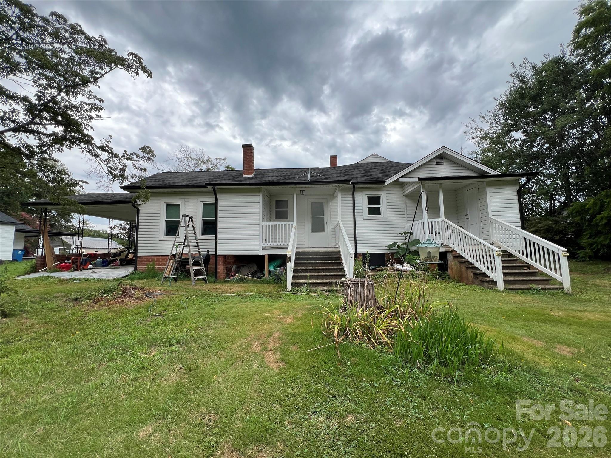 473 Boss Moore Road Ellenboro, NC 28040 - Photo 23 of 29 a view of a house with backyard
