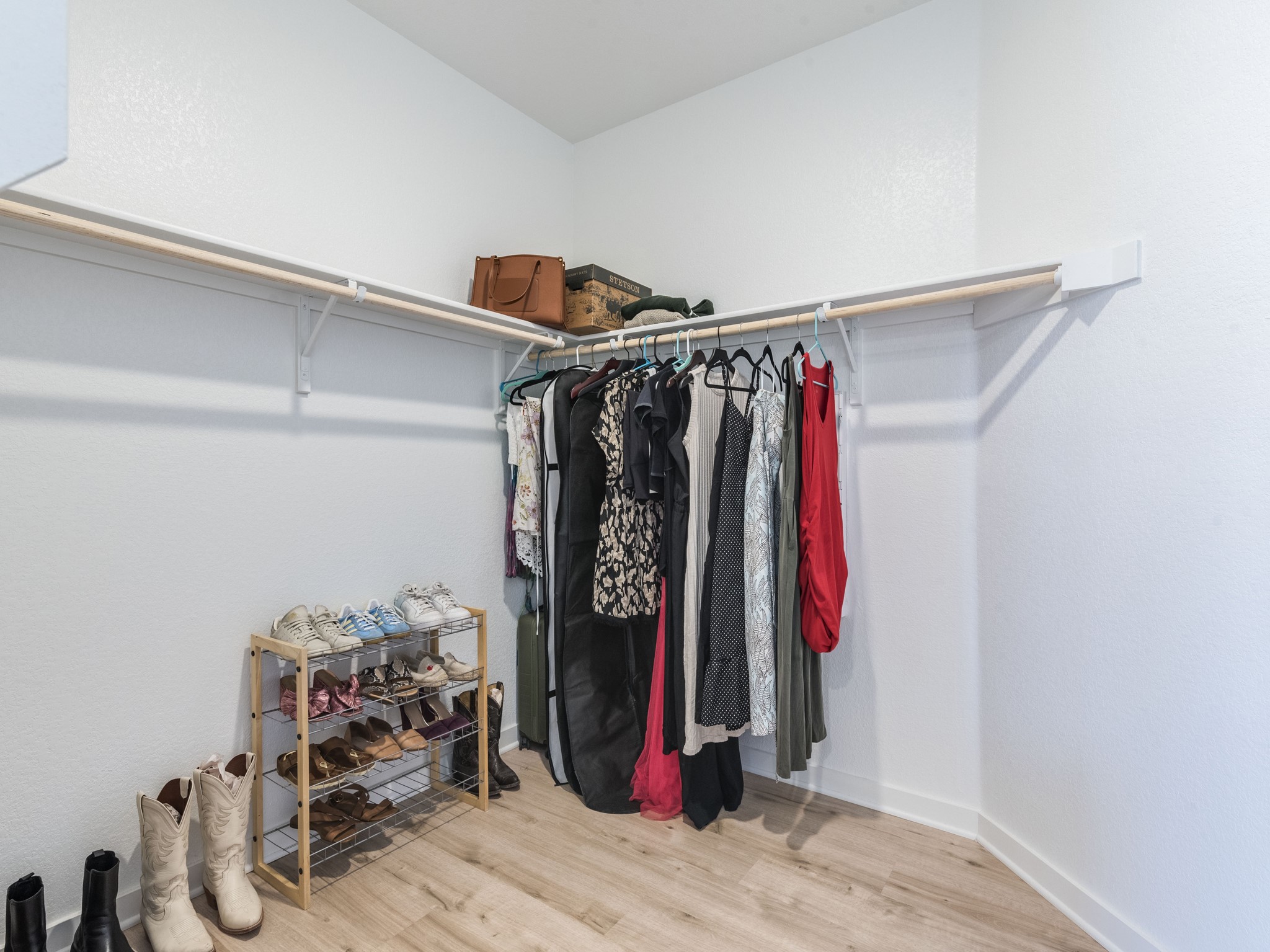 2132 Centerline Lane Georgetown, TX 78628 - Photo 14 of 30 Walk in closet #1 three sides rods and shelving