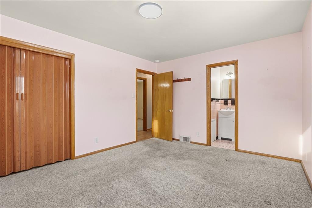 431 Colonial Drive Monroeville, PA 15146 - Photo 15 of 28 an empty room with closet and wooden floor