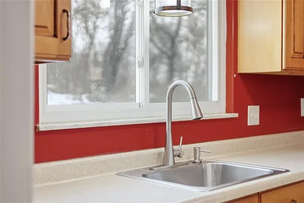 a close view of a sink and tap