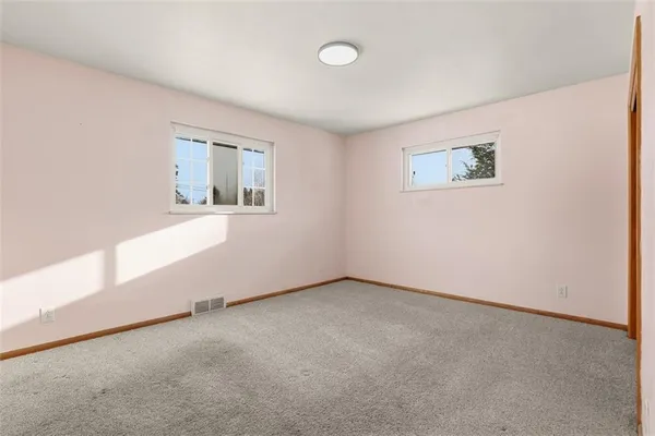 an empty room with a workbench