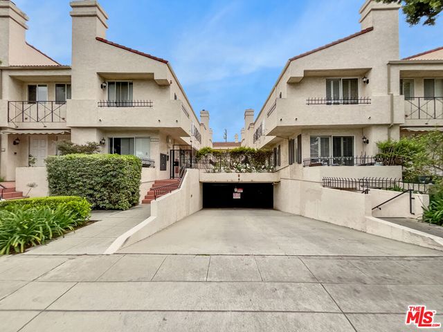 a large white building with a large windows
