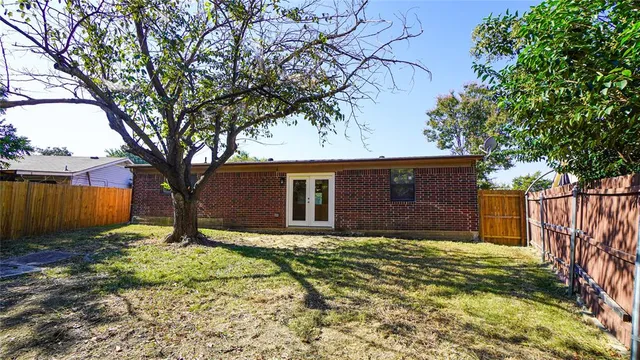 a house with trees in front of it