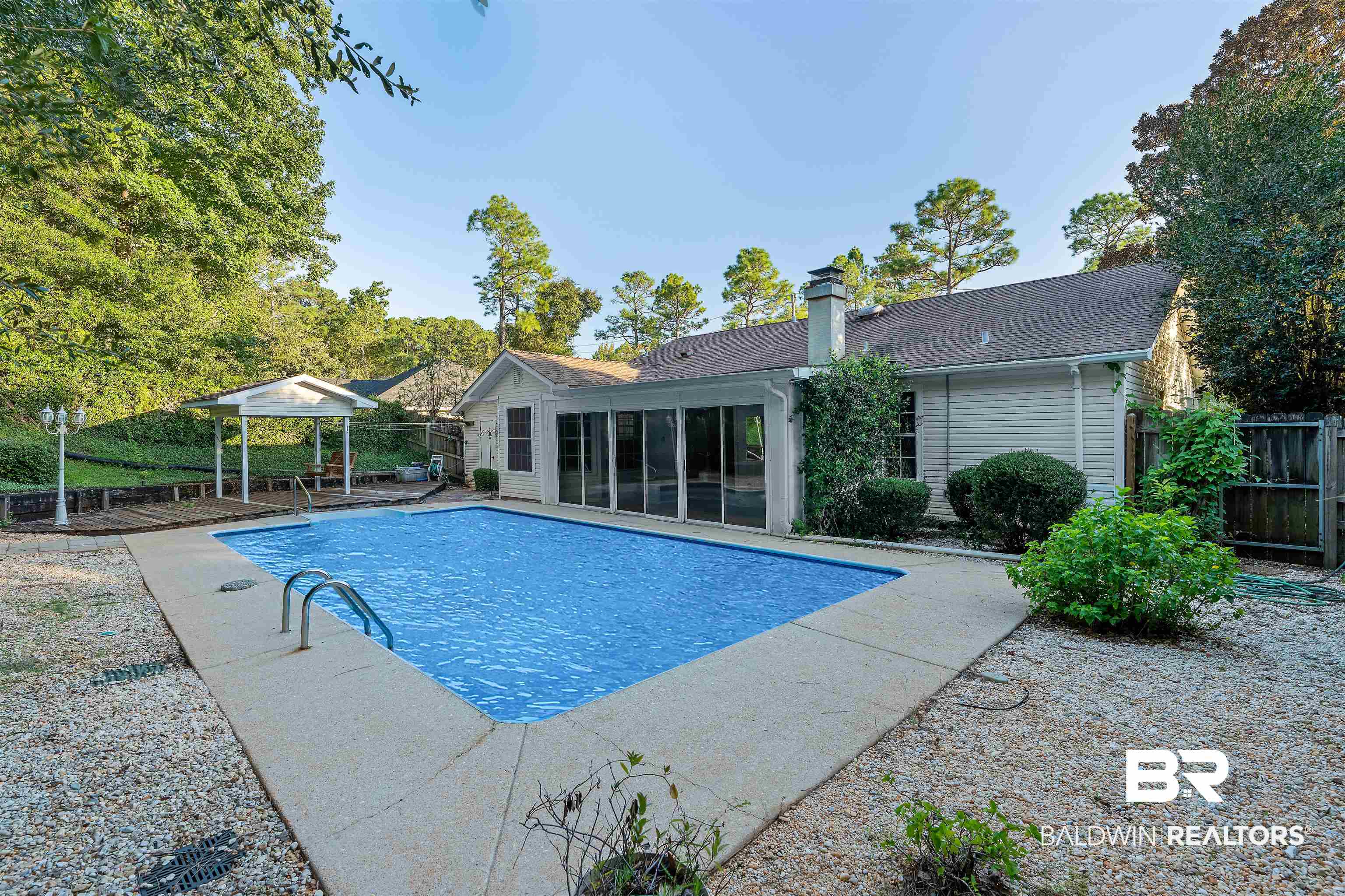438 Ridgewood Drive Daphne, AL 36526 - Photo 3 of 28 View of swimming pool featuring a patio area