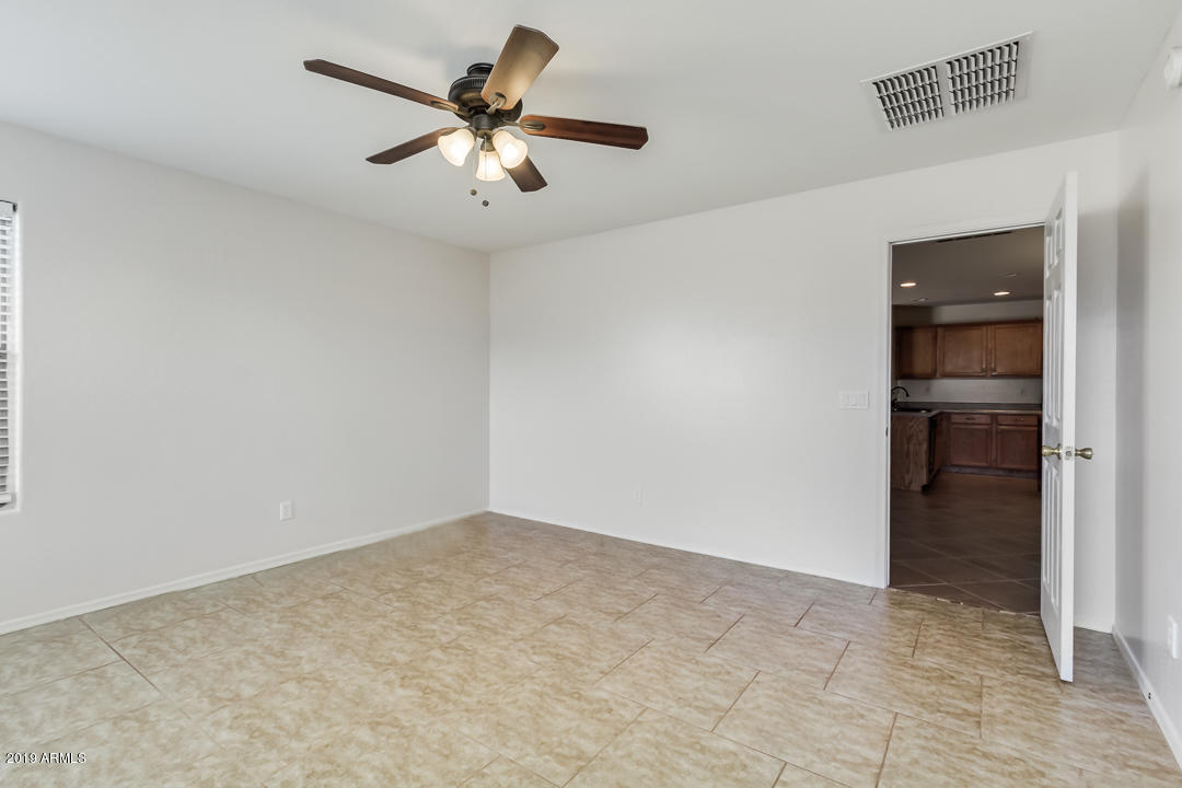 1986 West Tanner Ranch Road Queen Creek, AZ 85144 - Photo 21 of 32 an empty room