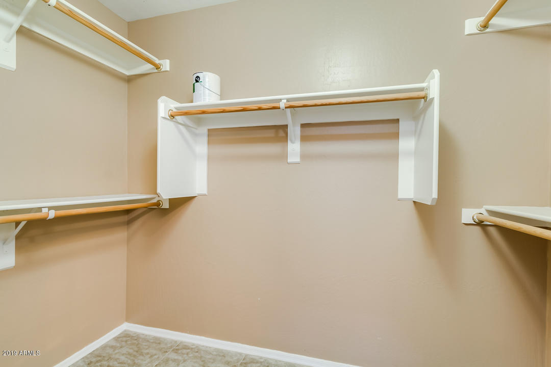 1986 West Tanner Ranch Road Queen Creek, AZ 85144 - Photo 24 of 32 a view of walk in closet