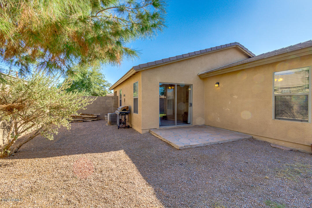 1986 West Tanner Ranch Road Queen Creek, AZ 85144 - Photo 28 of 32 a view of a house with a backyard