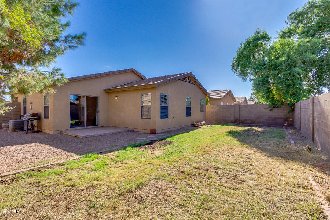 1986 West Tanner Ranch Road Queen Creek, AZ 85144 - Photo 30 of 32 a view of a house with a yard