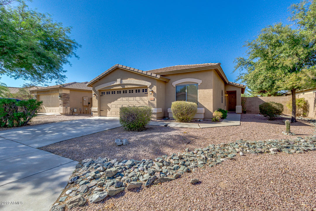 1986 West Tanner Ranch Road Queen Creek, AZ 85144 - Photo 3 of 32 a front view of a house with a yard
