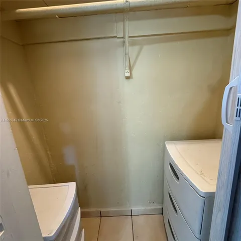 a bathroom with a sink a toilet and a shower
