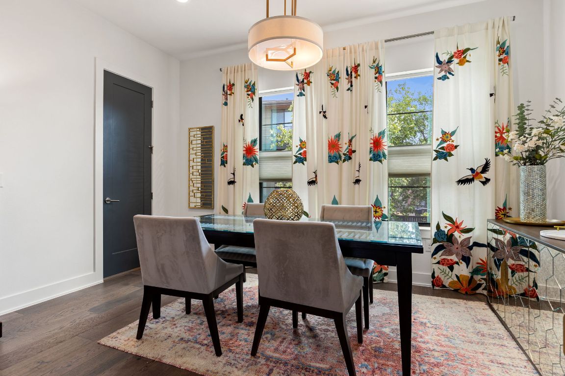 3700 Clawson Road, Unit 503 Austin, TX 78704 - Photo 12 of 39 a view of a dining room with furniture and wooden floor
