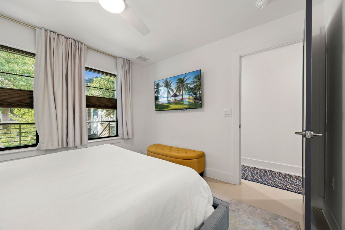 3700 Clawson Road, Unit 503 Austin, TX 78704 - Photo 15 of 39 a bedroom with a bed and a window