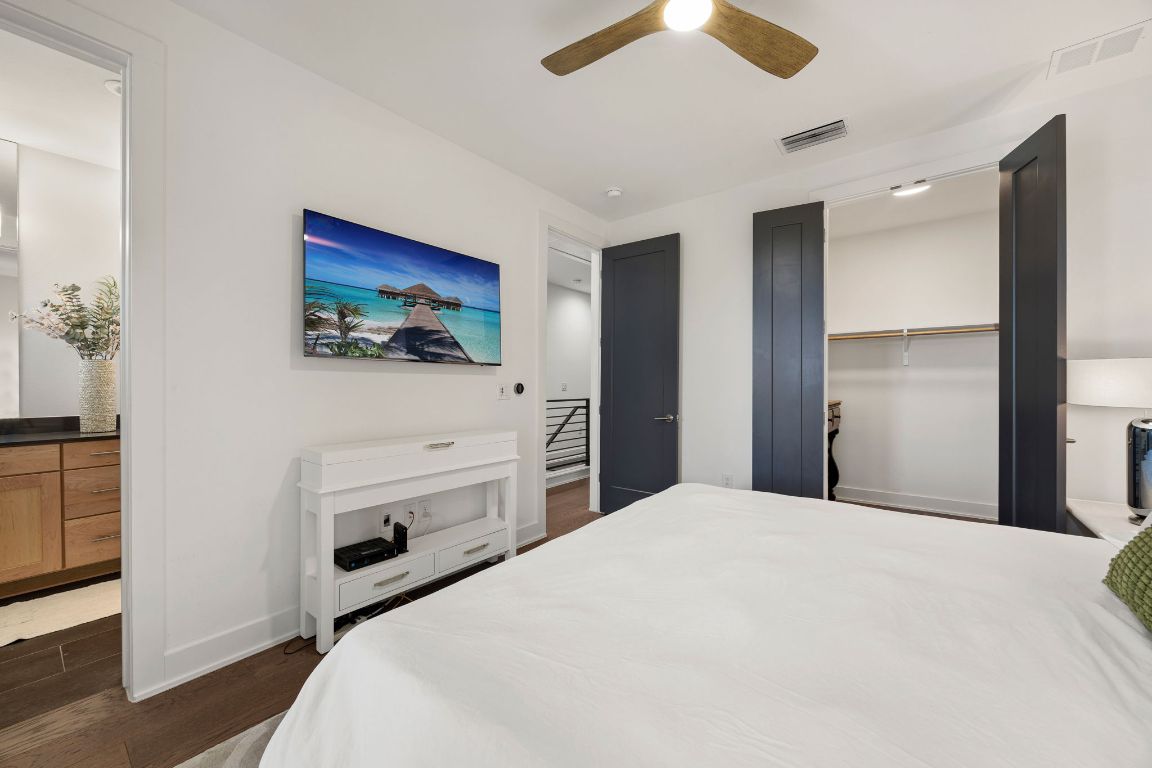 3700 Clawson Road, Unit 503 Austin, TX 78704 - Photo 18 of 39 a bedroom with a bed and a flat screen tv