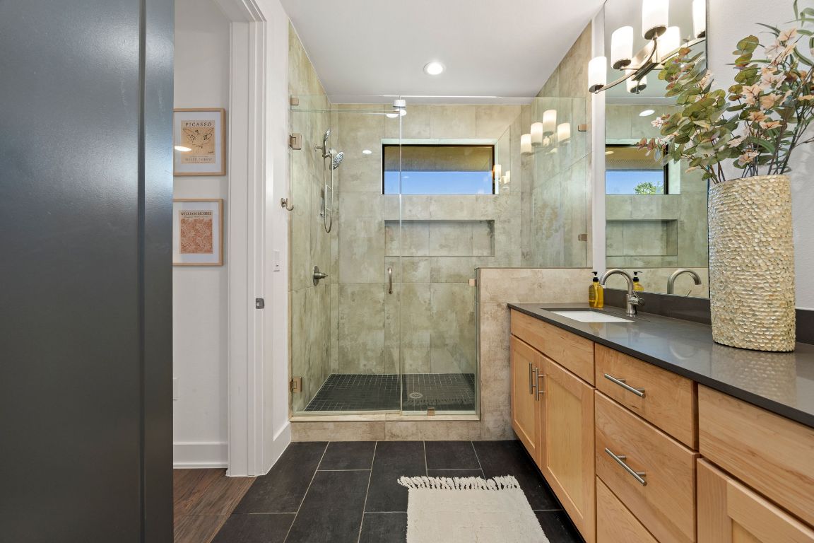 3700 Clawson Road, Unit 503 Austin, TX 78704 - Photo 19 of 39 a spacious bathroom with a shower and a sink